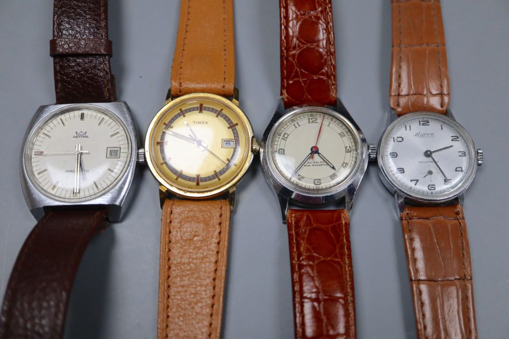 Four assorted wrist watches including Astral, Aurex & Timex.